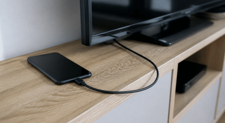 telephone pose sur meuble connecte a television par cable hdmi